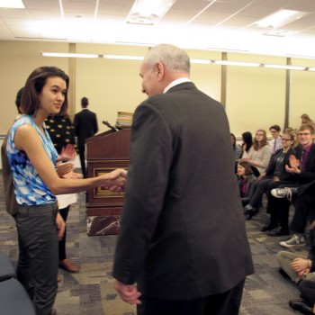 Youth Policy Cohort member, Haily Gill, greets Minnesota Governor Mark Dayton